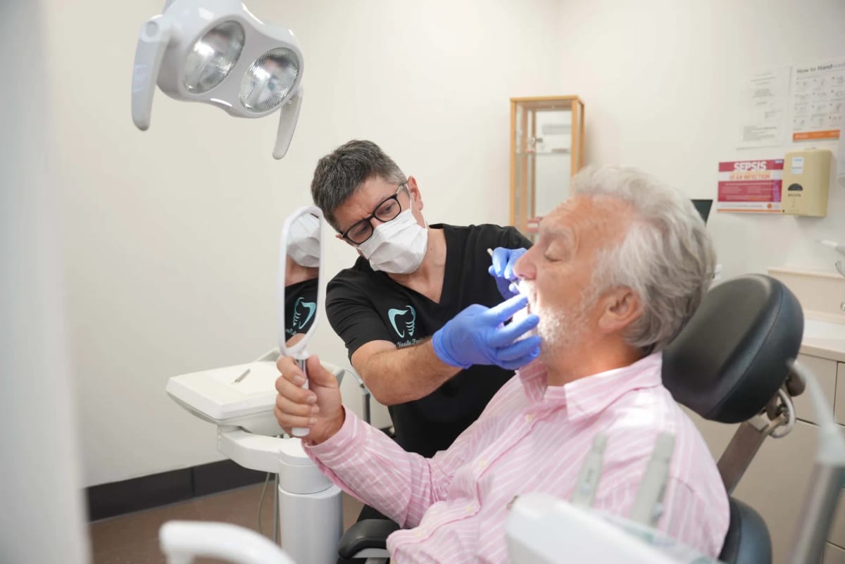 Dentist carrying out a routine examination at Kington Dental
